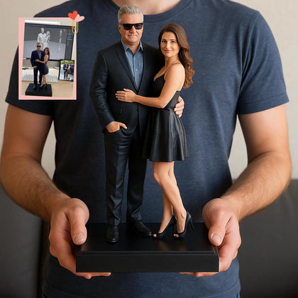 Custom bride and groom figurine on a display base